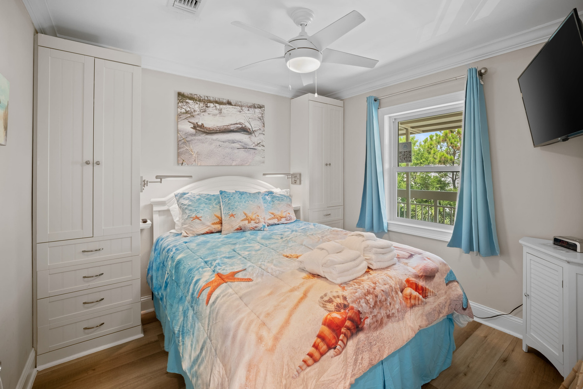 Bedroom with Built ins and reading lights at head of Bed w USB chargers, roku smart tv