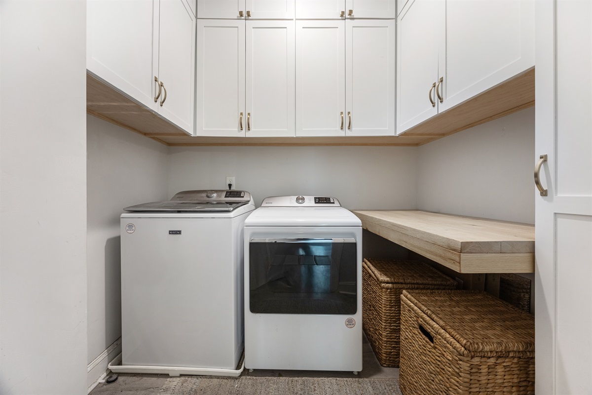 Freshen up your clothes anytime with our easy-to-use laundry space