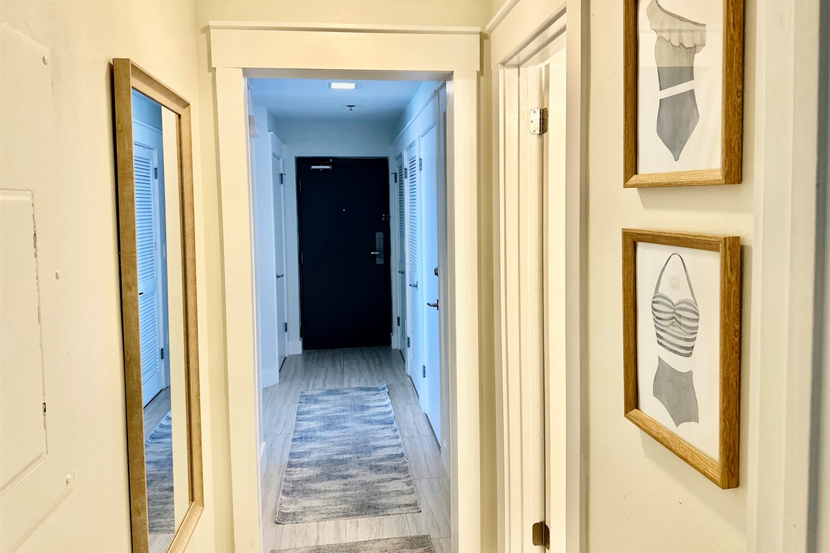 Down this hall are the two guest bedrooms and bathroom.