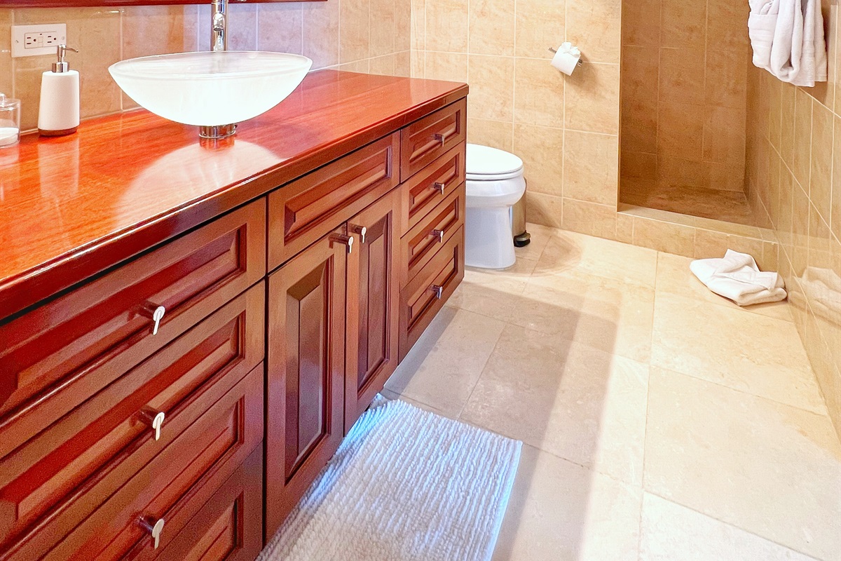 A sleek, modern bathroom that elevates your stay.