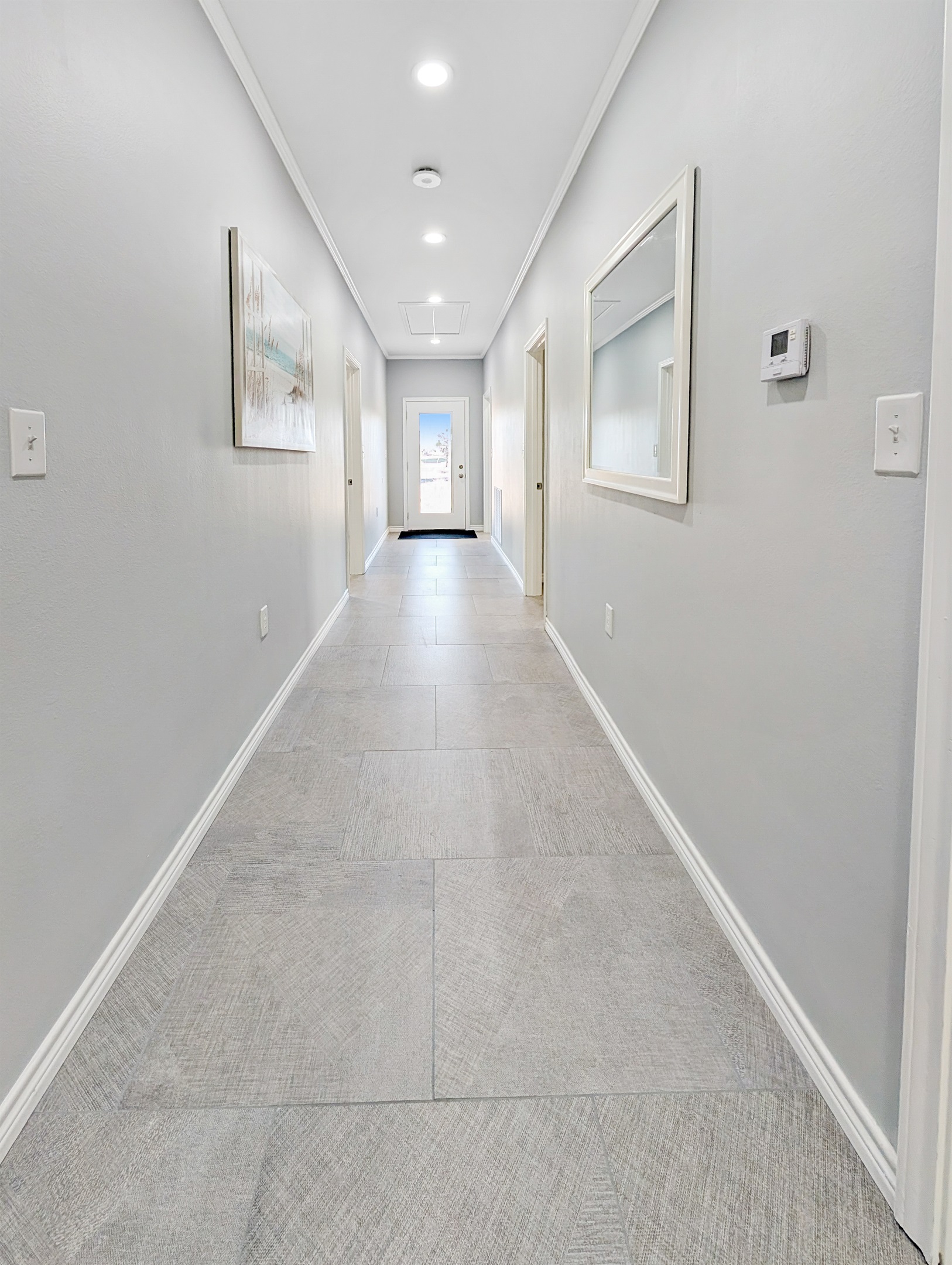 Cool flooring and coastal colors throughout