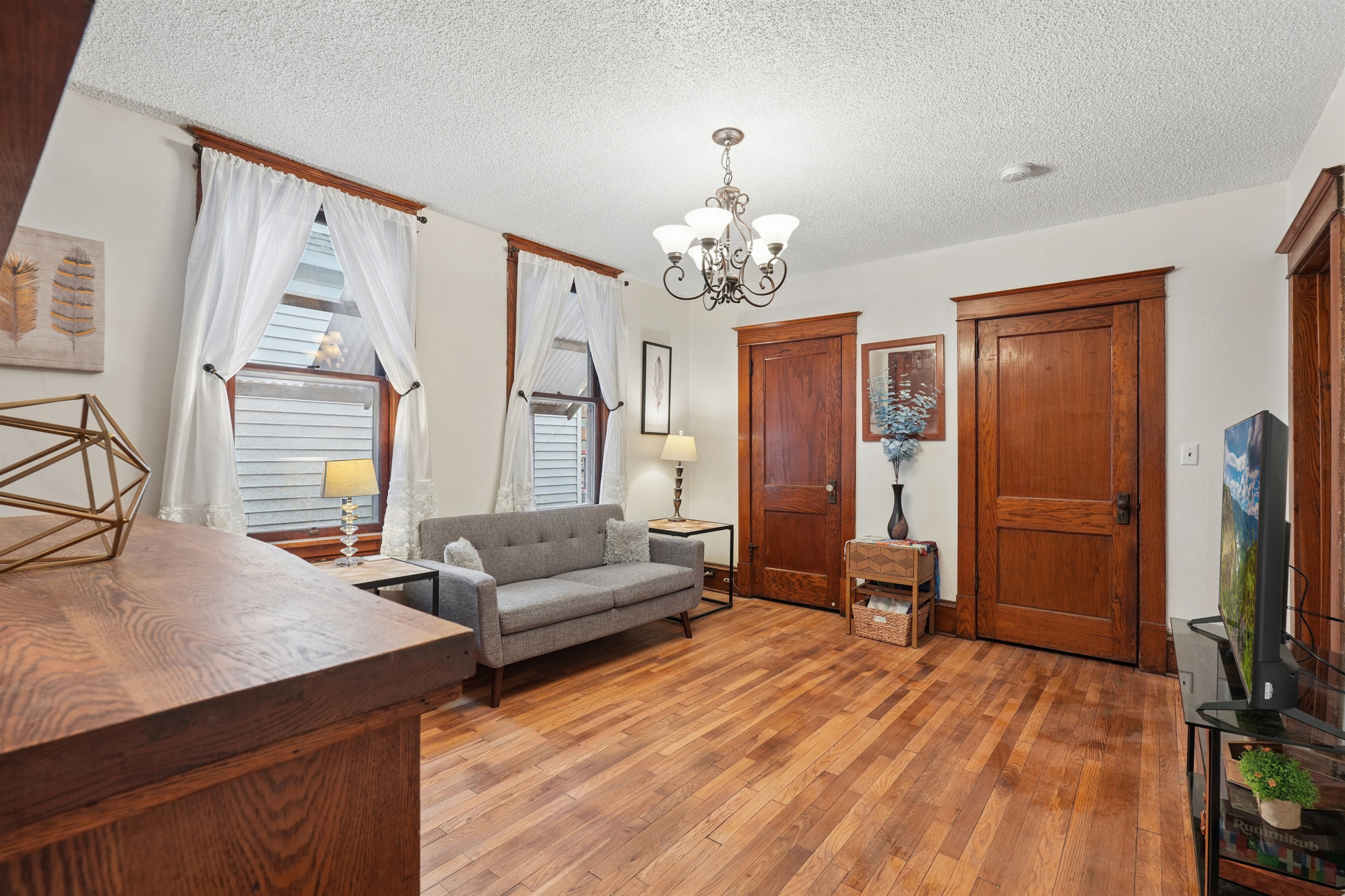 For short or long-term stays, the living room offers plenty of extra storage with two large closets.