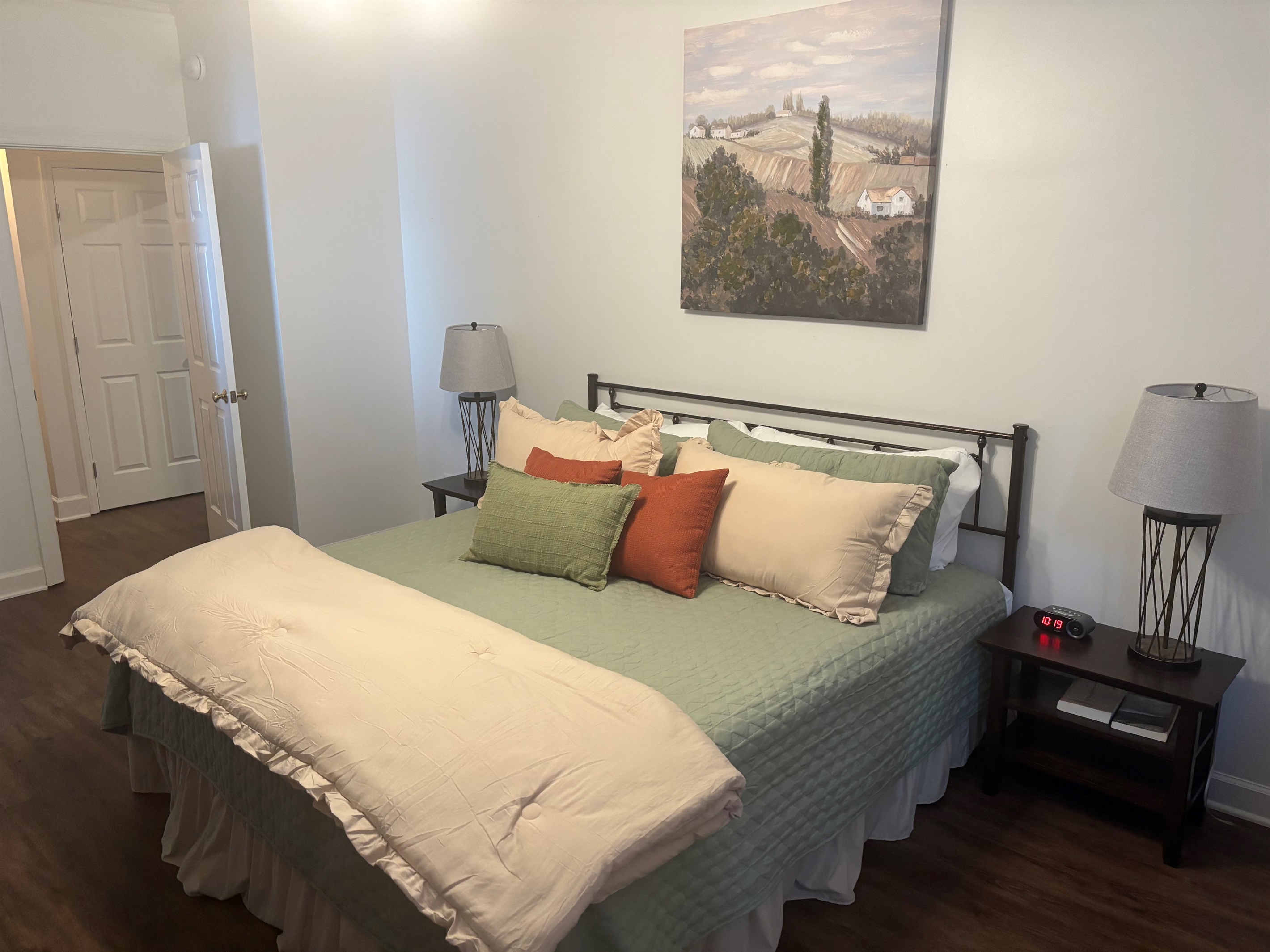 Master bedroom with king bed and large TV, ensuite bathroom and walk in closet.