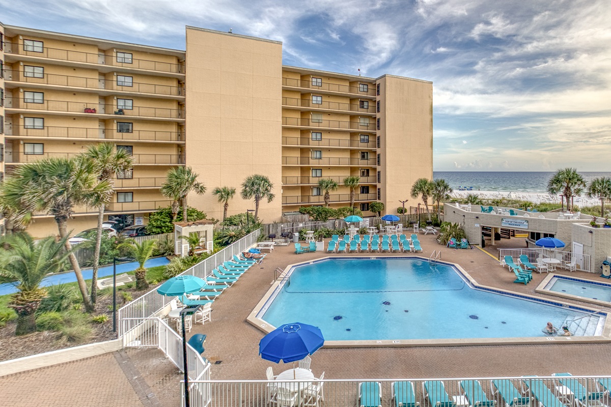 Sparkling pool w/ toddler pool, charcoal grills, sun deck, Snack Shack, and private beach access with showers