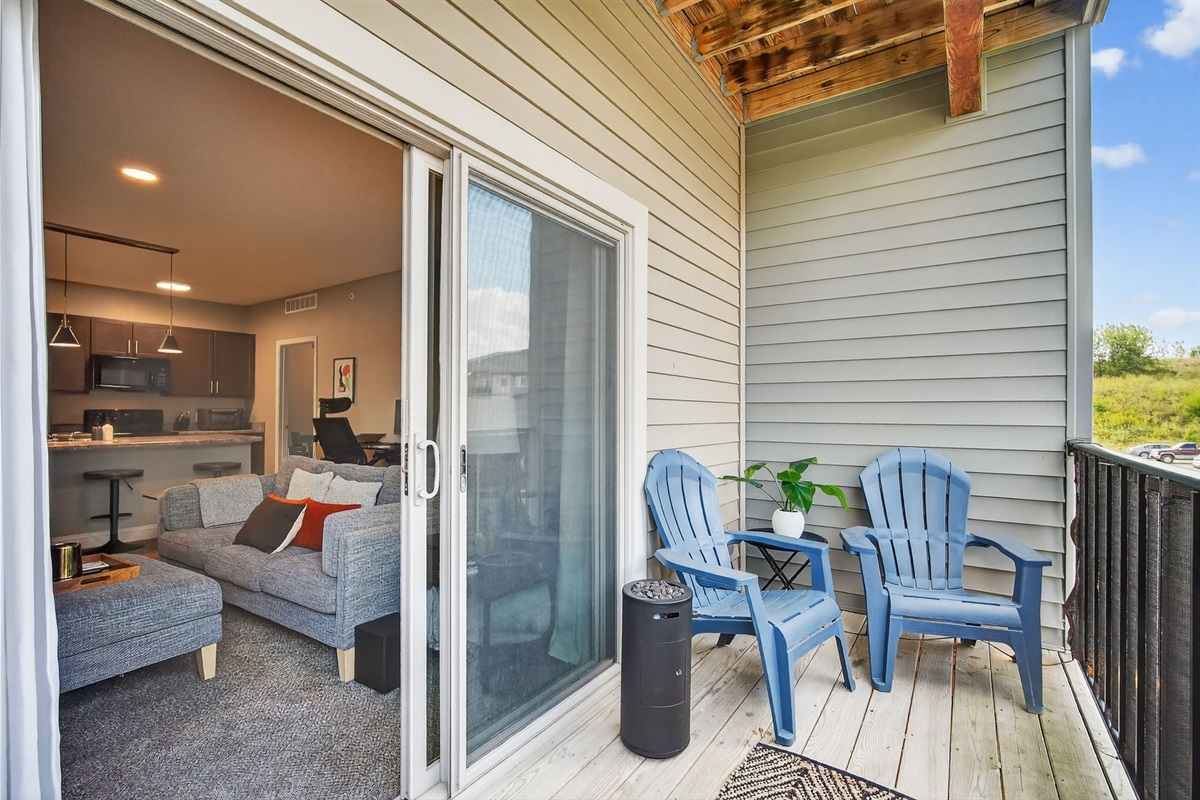 Flowing seamlessly from the living room, your private balcony also includes a privacy fence.