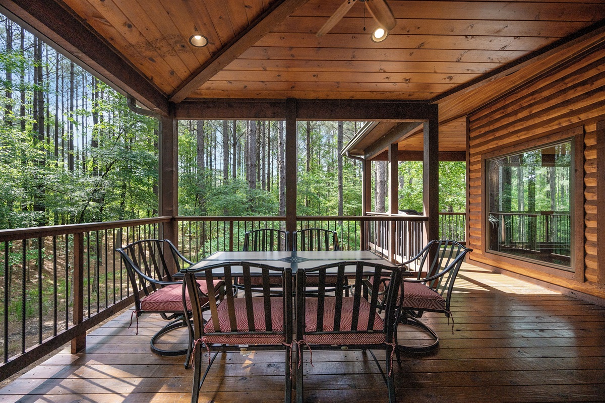 An outdoor dining area is covered, so it can be enjoyed even during a rain storm