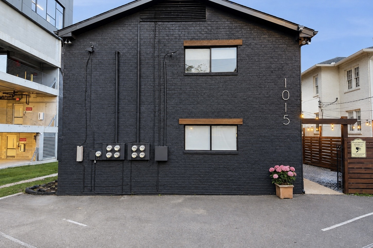 Rear of the building where you park.