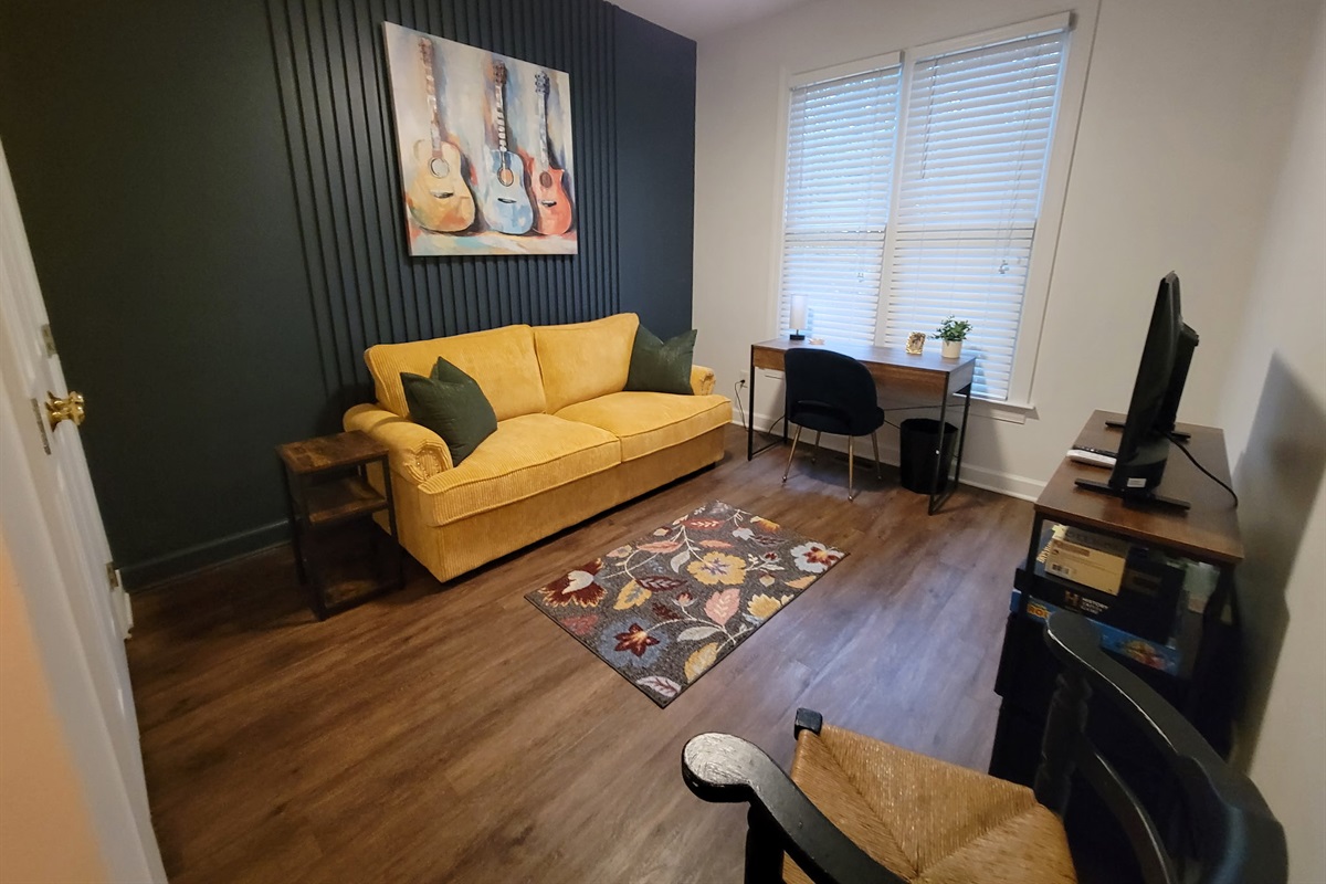 Office/3rd bedroom has pull out queen bed and TV. Also has kids items in closet like pack and play, bouncy seat, and stroller.