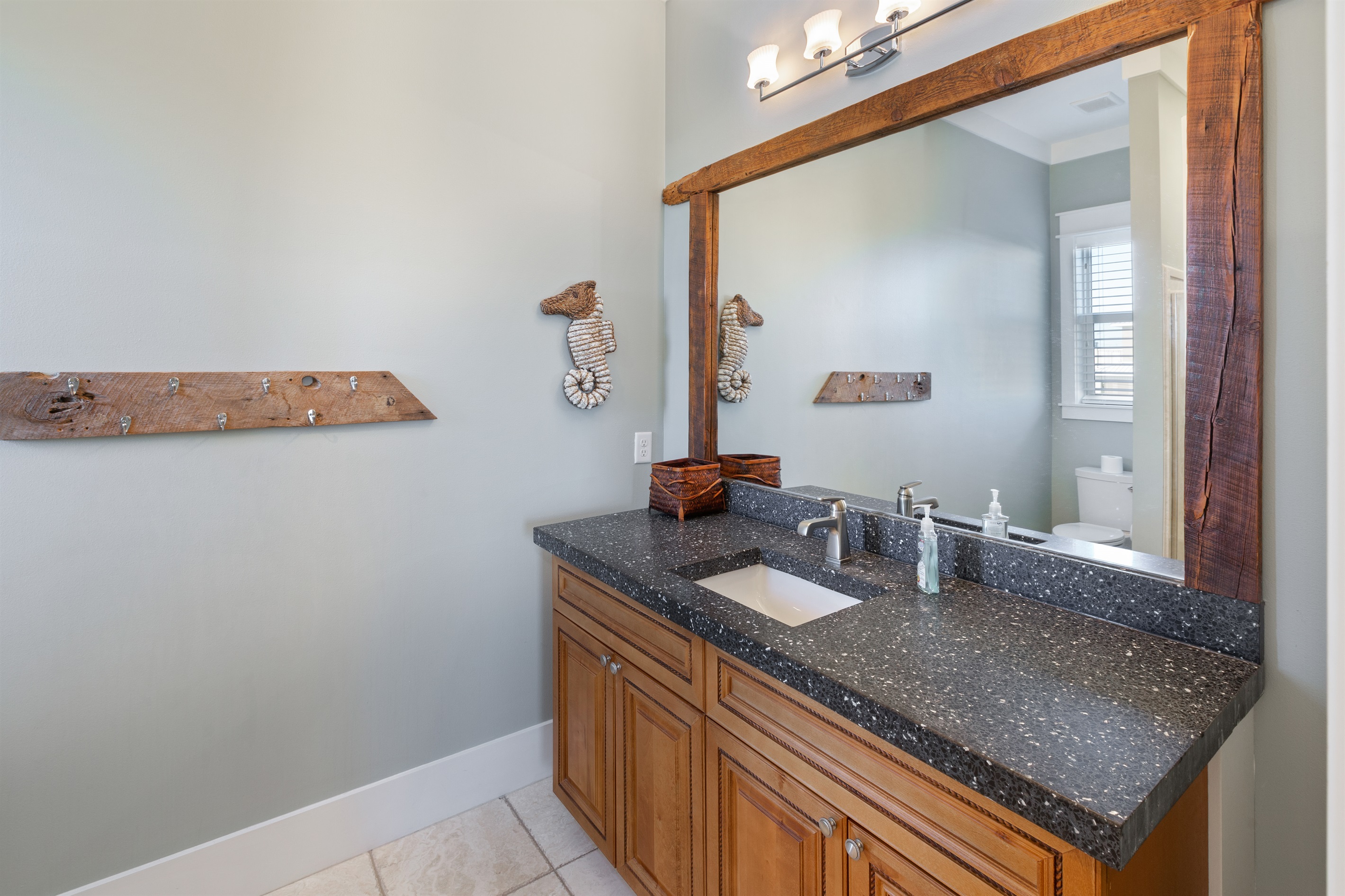 Unique vanity adds a one of a kind feel to the private bath attached to the Crab room on the second floor.