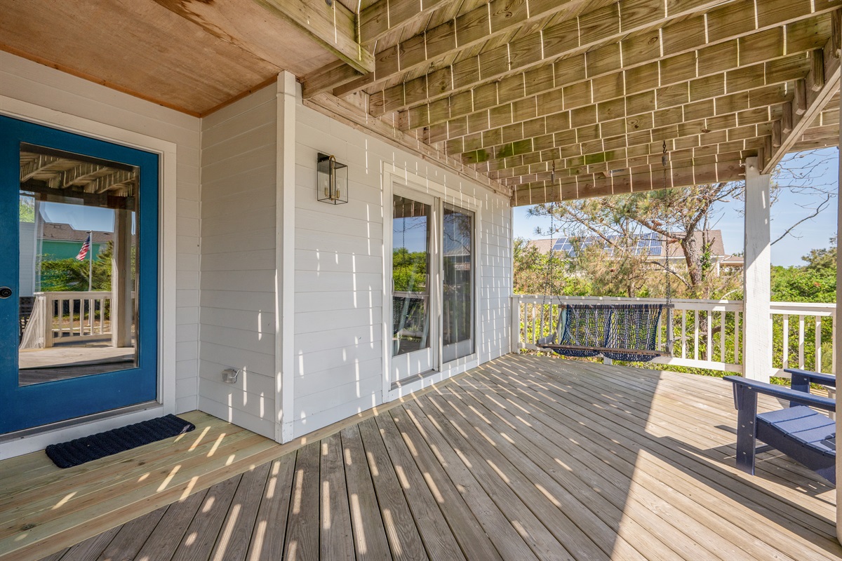 Large shaded deck perfect for morning coffee, afternoon lounging, or evening conversation.