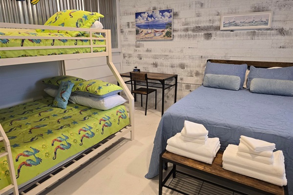 Bedroom 3 - 1 full sized bed and 1 bunk bed with a full and twin. Also includes desk and chair and TV