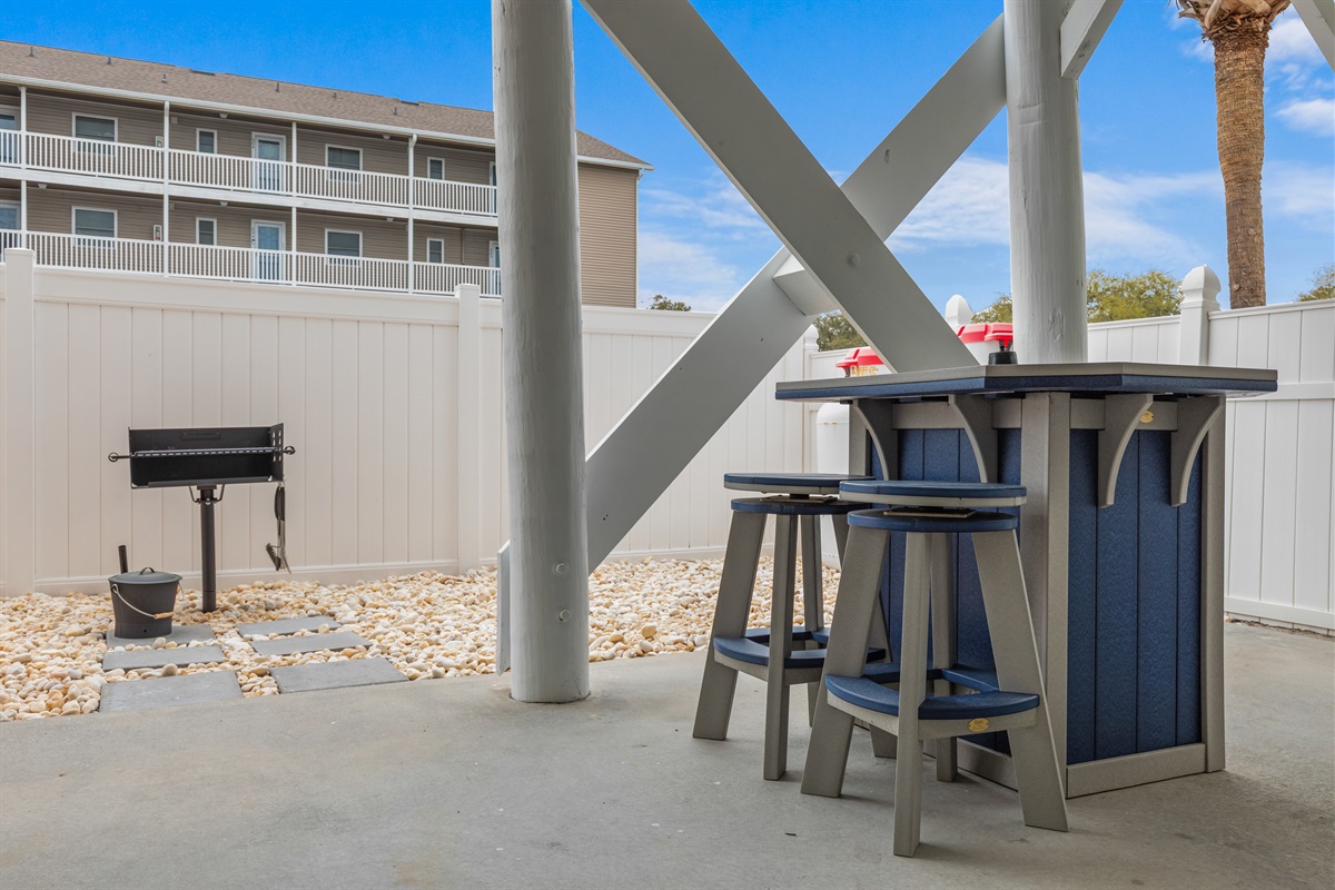 Grill up some yummy BBQ on the charcoal grill conveniently located next to the outdoor entertainment area.