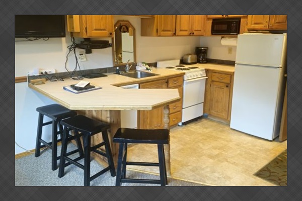 Breakfast nook area next to kitchen. 