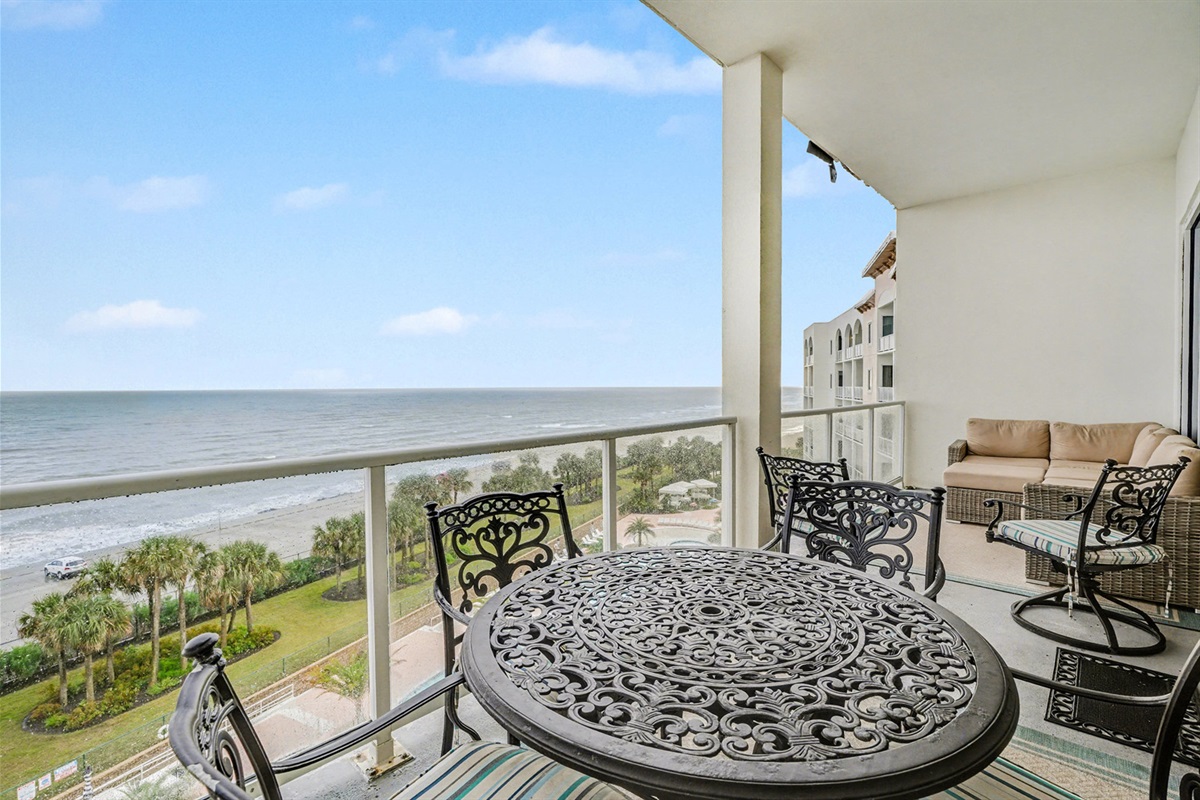 Lots of space on this balcony with dining table
