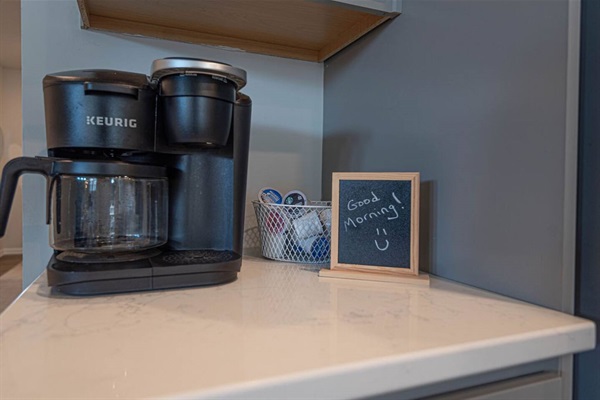 Step into our coffee wonderland! Equipped with a caffeine-powered engine (Keurig) and an arsenal of magical beans, this station is where mugs get their daily dose of sass and humans turn into coffee-fueled unicorns. ☕