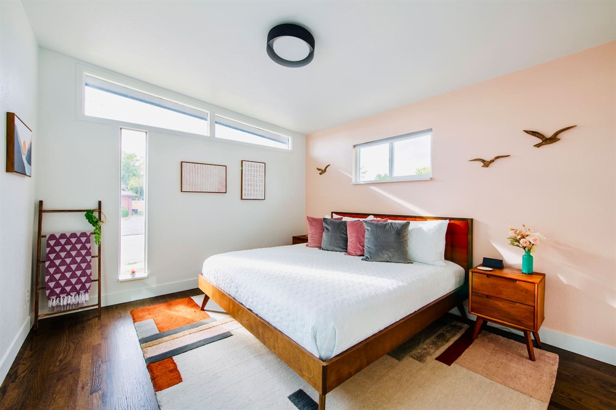 Bright primary suite with king bed & ensuite bath.