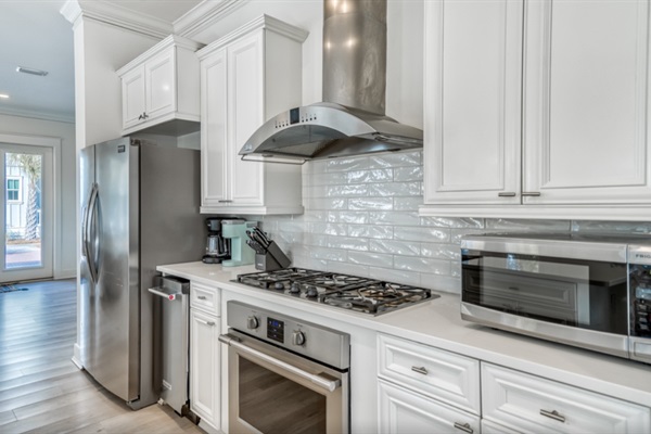 Chef's Kitchen featuring top end appliances