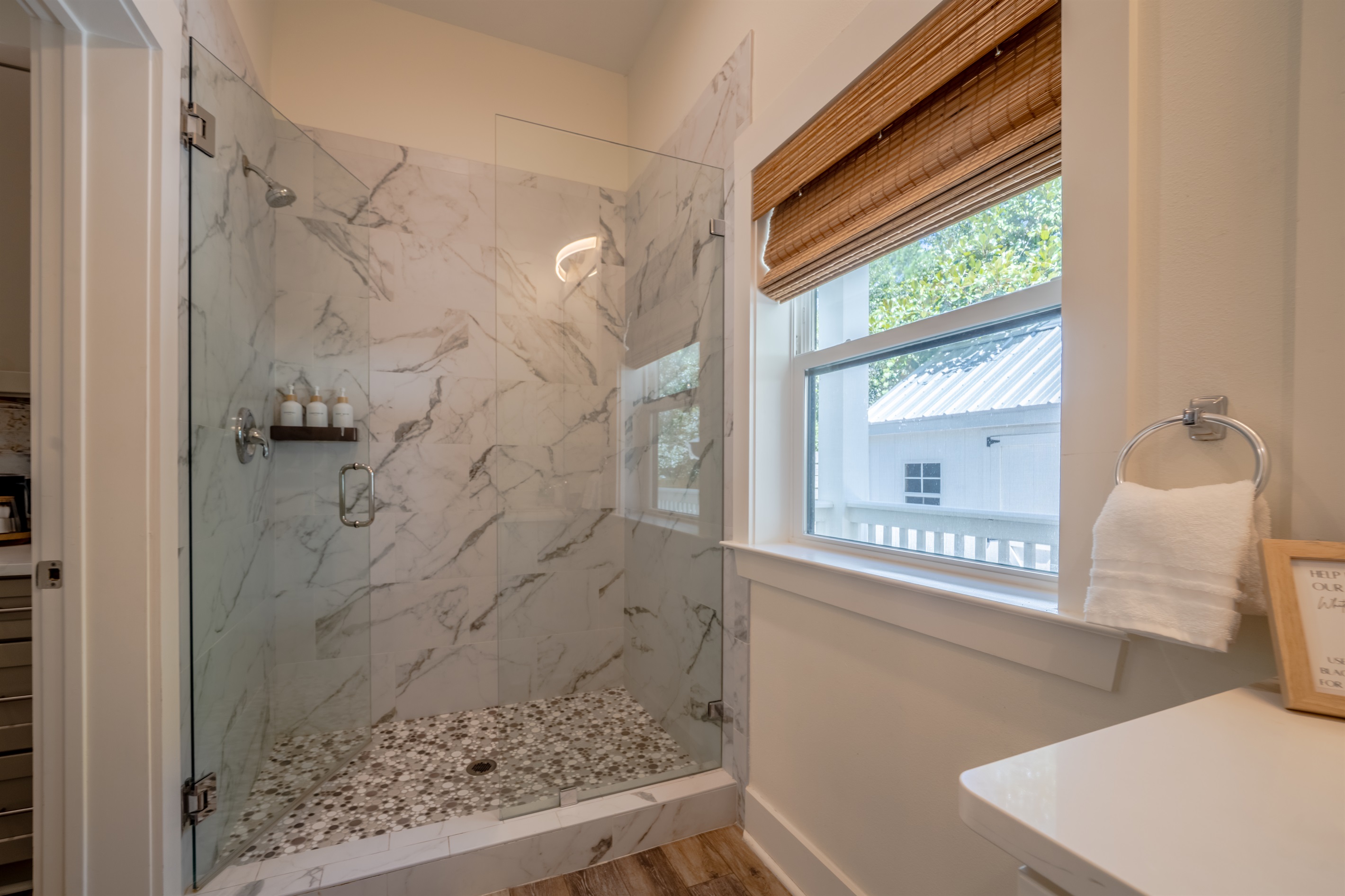 Jack and Jill full bathroom conveniently located between the kitchen and bedroom