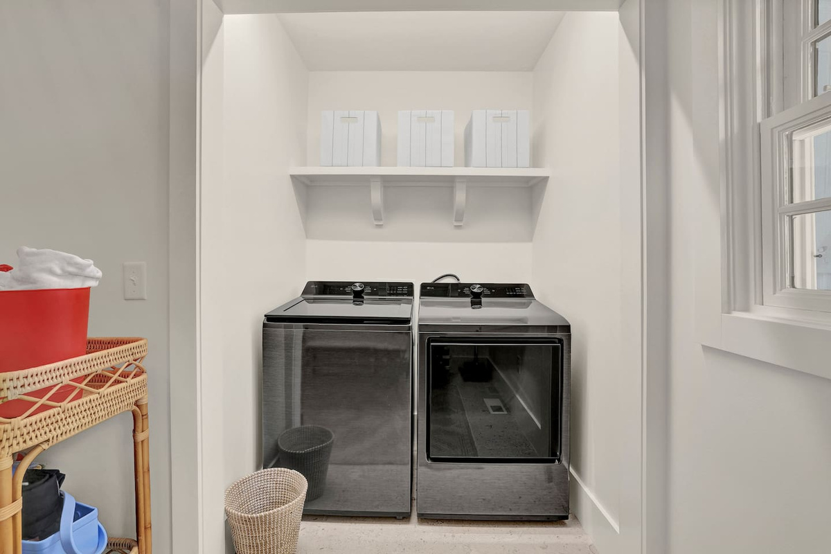 Laundry area/mudroom located at the back of the home beside kitchen