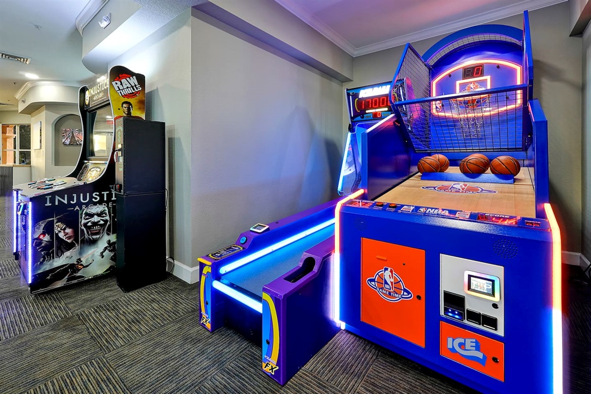 Play games at the club house Arcade including Skee-Ball and basketball