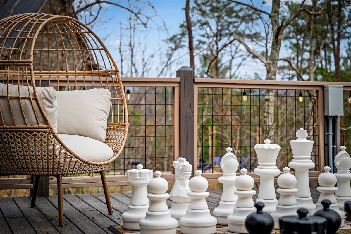Play a game of giant chess or relax in the cozy egg chair while enjoying the peaceful Smoky Mountain surroundings.
