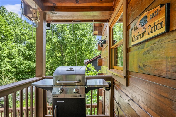 Propane grill on front porch