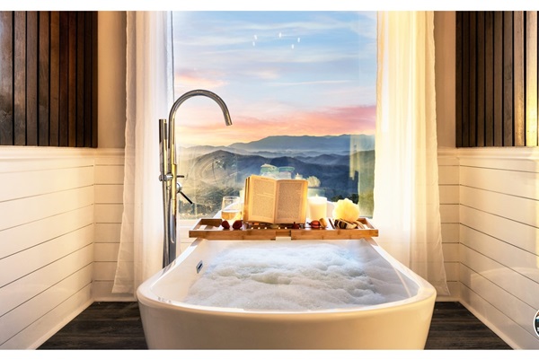 Take in that GORGEOUS mountain view from the big window while soaking in this freestanding tub. It'll make you feel like stepping into a postcard you always dreamed of in a lifestyle magazine. Enjoy your stay.