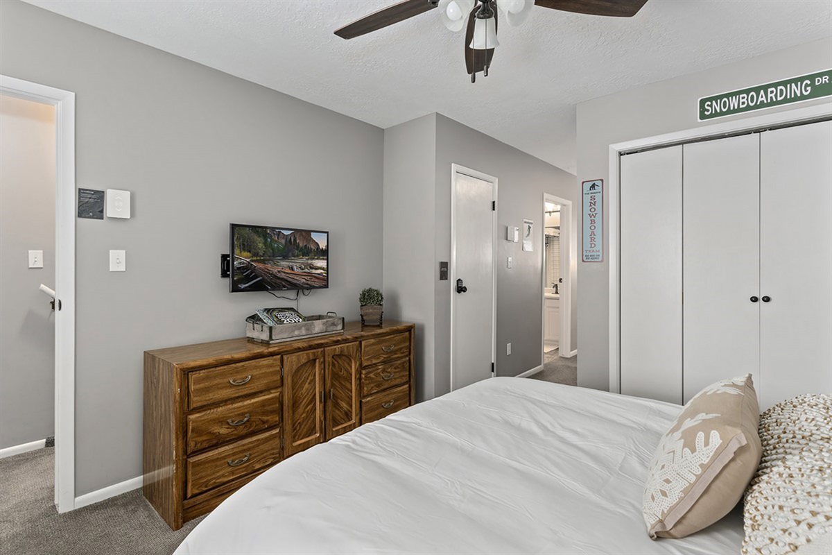 Bedroom has a TV—ideal for relaxing nights in.