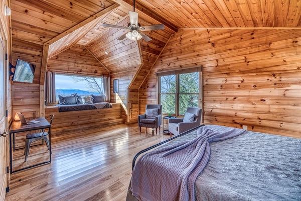 Huge window & amazing mountain views from one of the 2 upstairs bedrooms, both with a sleeping nook with a twin bed (and both also have a king bed and private bathrooms).