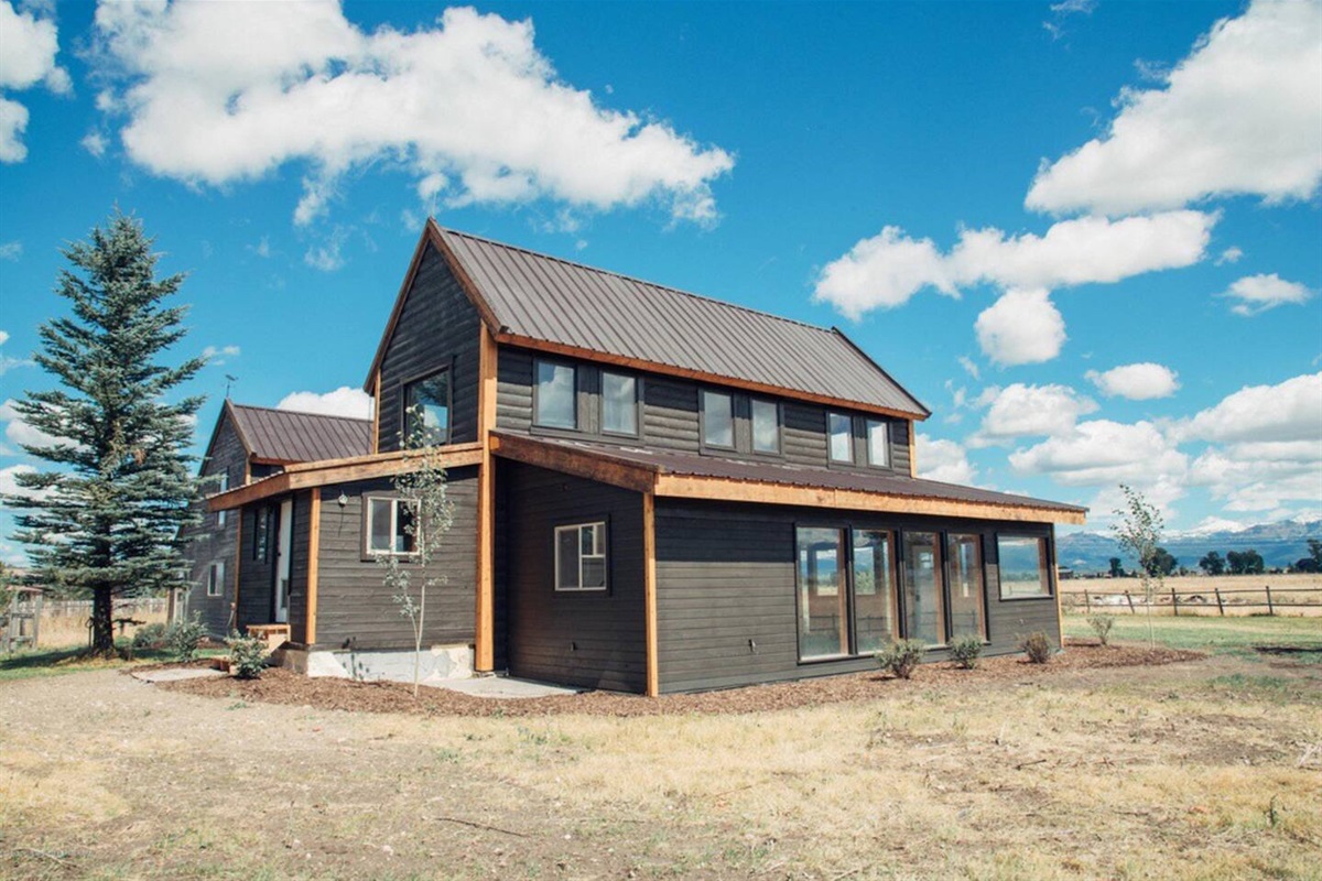 The farmhouse-style home is just minutes away from fishing, hiking, golfing, exploring, skiing, and so much more!