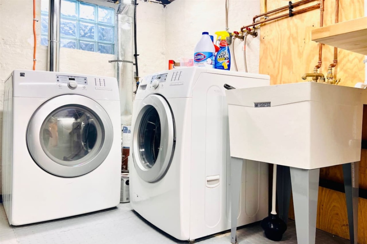 Convenient laundry area with a washer and dryer, making it easy to freshen up your clothes during your stay.