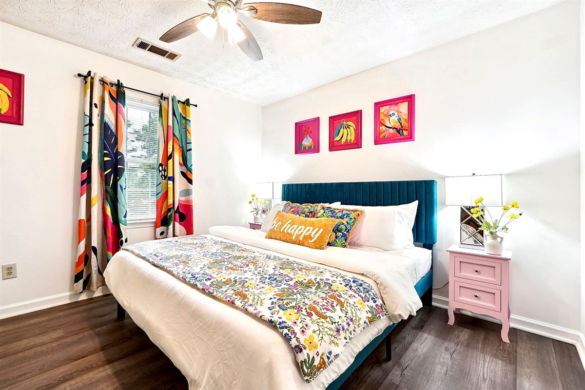 Bedroom 4 is located upstairs and features a king bed and TV. This room does not have a private en-suite bathroom but has access to a shared full bathroom on the second floor.