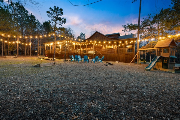 Little ones will enjoy ouy playset across the firepit!