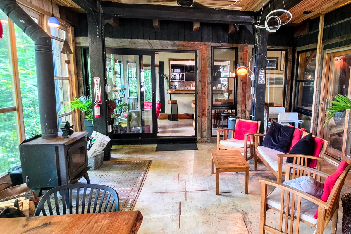 Veranda stove and seating area with wood stove