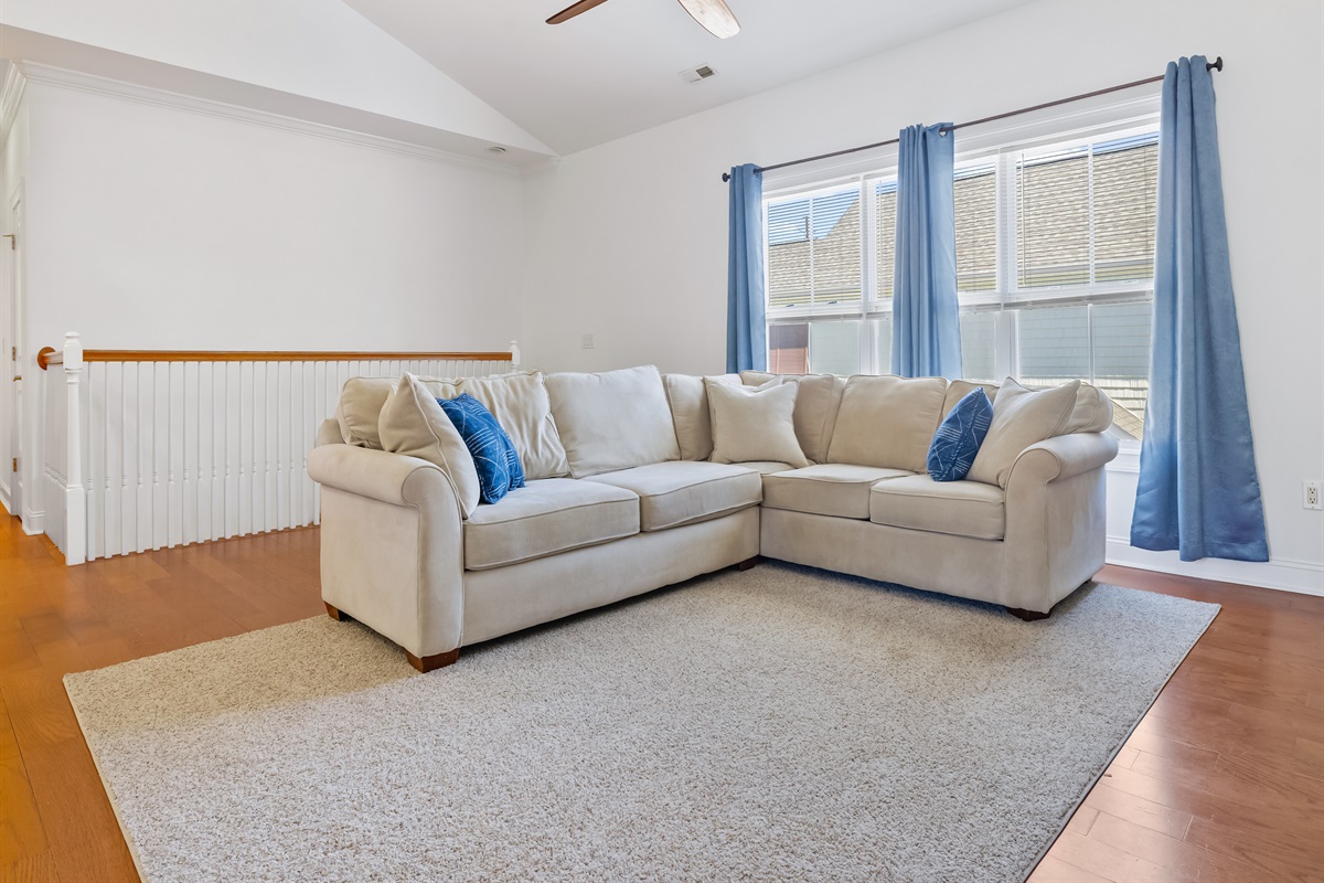 Stretch out, sink in, and stay awhile.
The oversized sectional is perfect for movie marathons, afternoon naps, and slow wind-down evenings. Plush seating, soft textures, and an airy vaulted ceiling create that just-right balance of cozy and spacious — ever