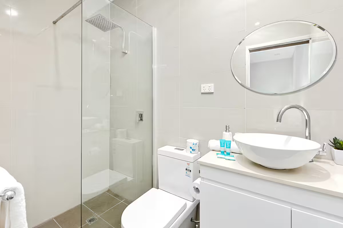 A bright bathroom layout and clean finishes give Sasha’s Cottage on the Hill a fresh, practical space for daily use.