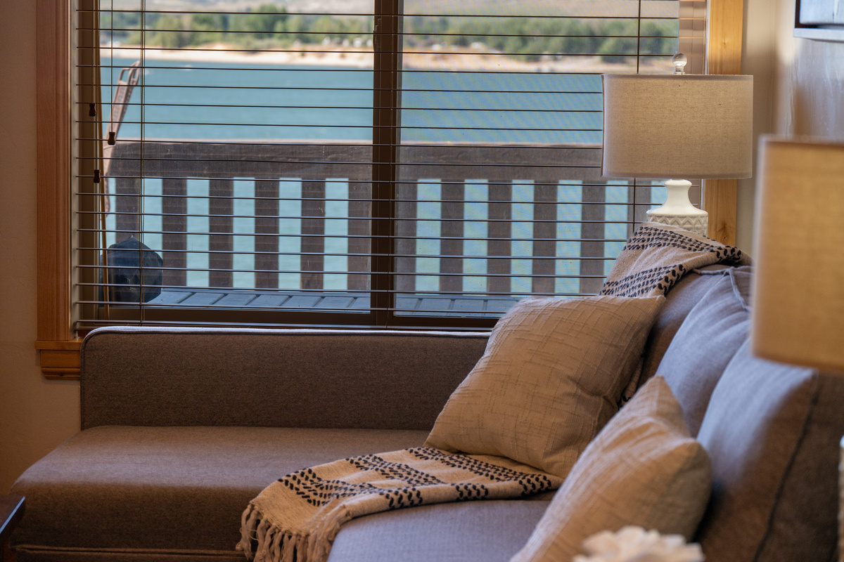 Cozy living room with beautiful views of Pineview Reservoir and the surrounding mountains.