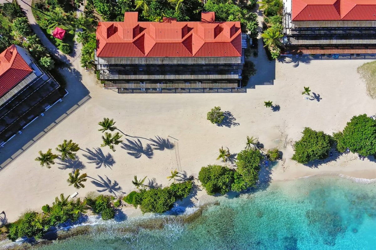 Drone shot of the Sapphire units along the beach.