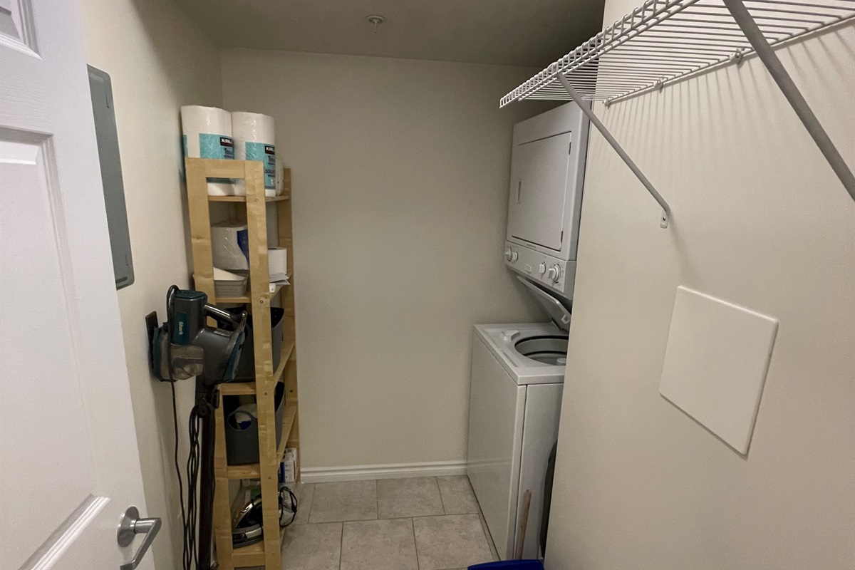 Laundry room with full size washer/dryer. We stock laundry supplies.