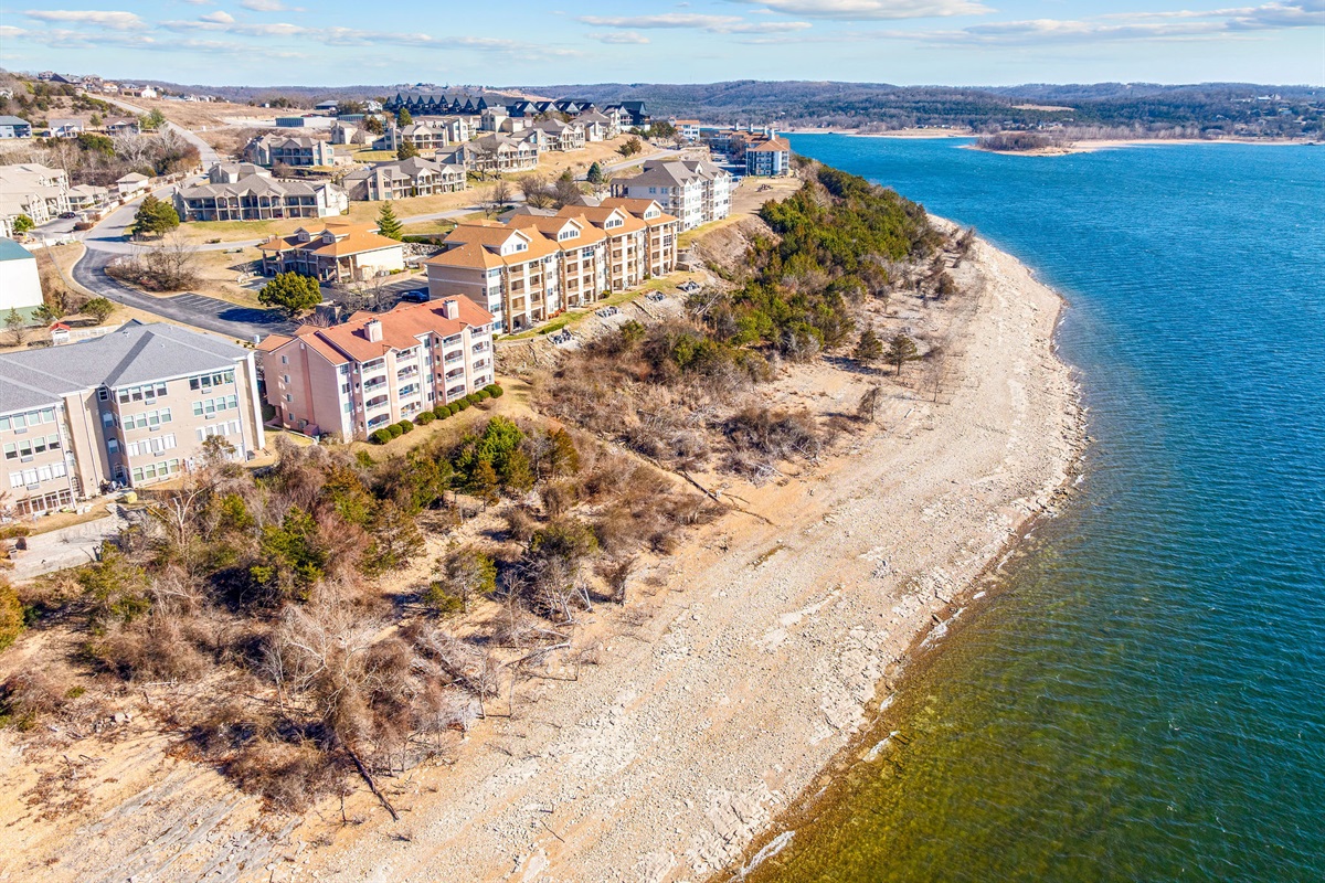 Dramatic peninsula setting surrounded by sparkling blue water.