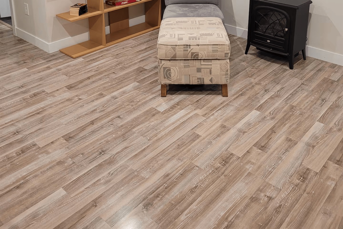 Common room sitting area and faux woodstove heater