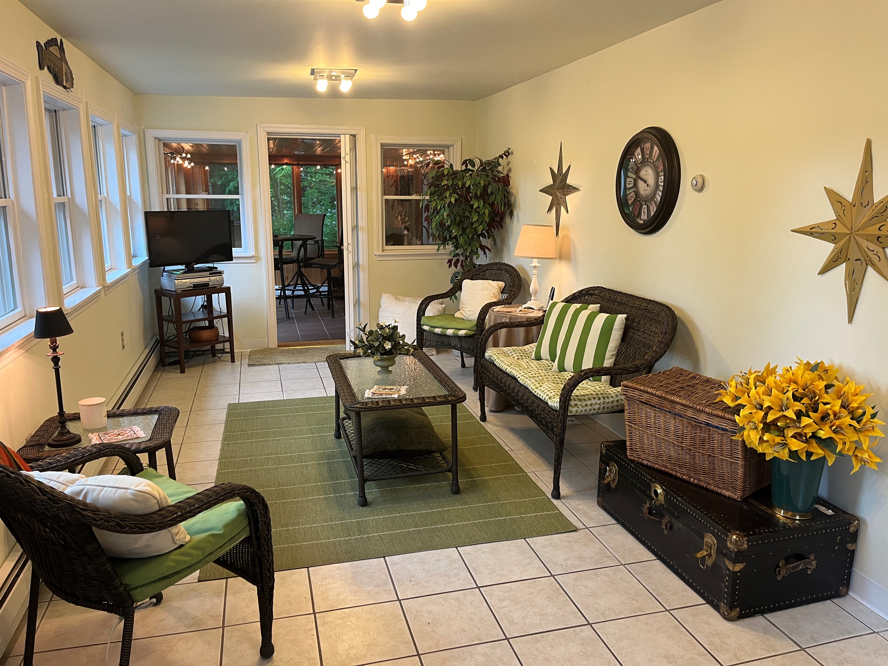 Lower level sunroom with access outside.