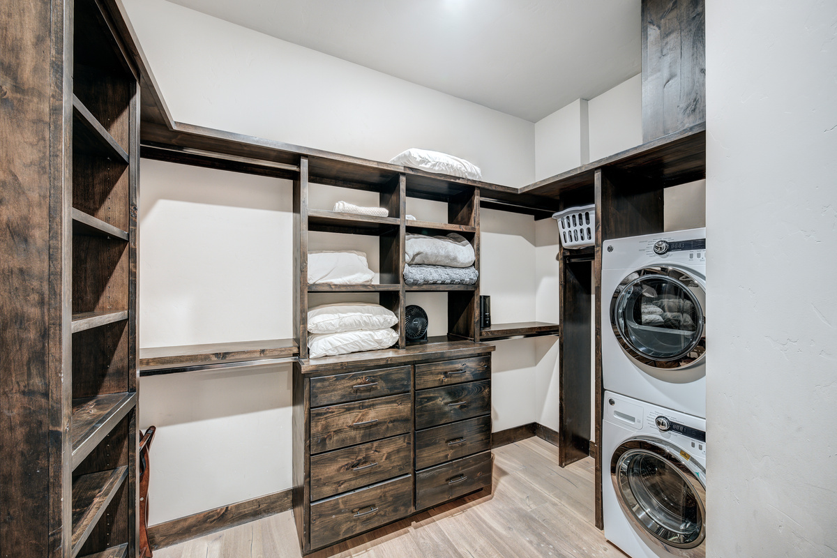 Bedroom #1 w/ensuite bath, private hot tub, fireplace, and laundry in closet.