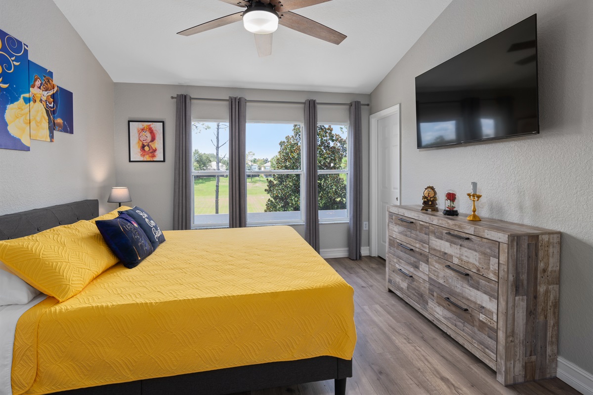 Spacious king primary suite with Beauty and the Beast touches
