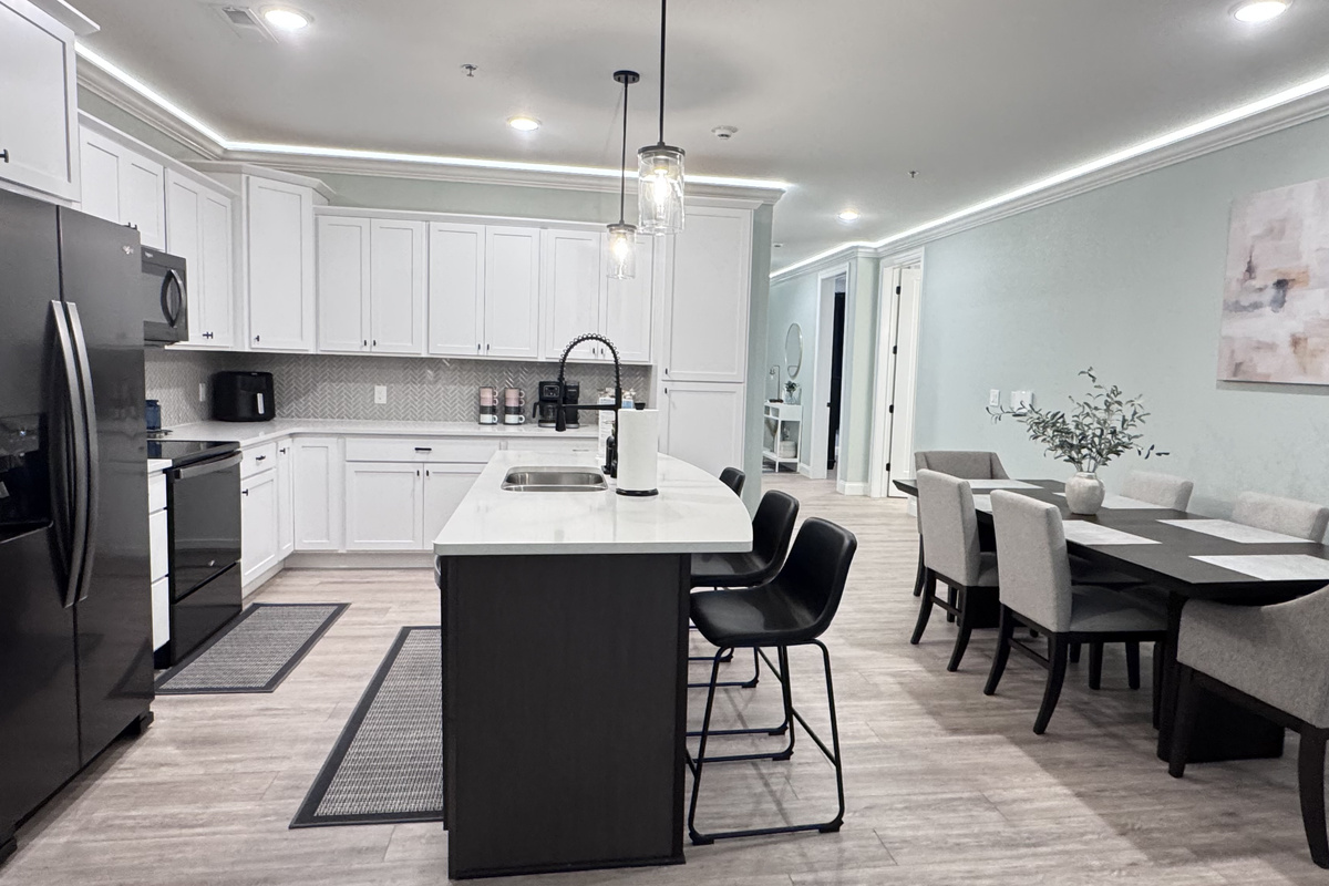 Kitchen island provides easy flow around the kitchen and extra seating at the bar.