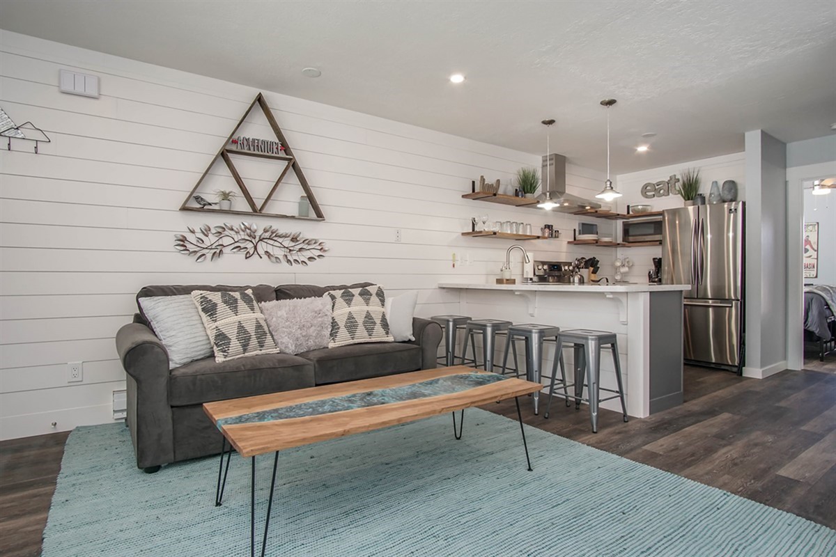 Open living and kitchen space designed for connection, conversation, and comfort.