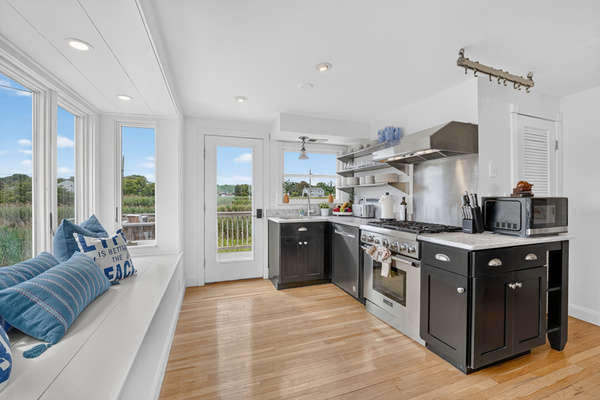 Bright, well-equipped kitchen with an open layout and easy access to the rest of the home.