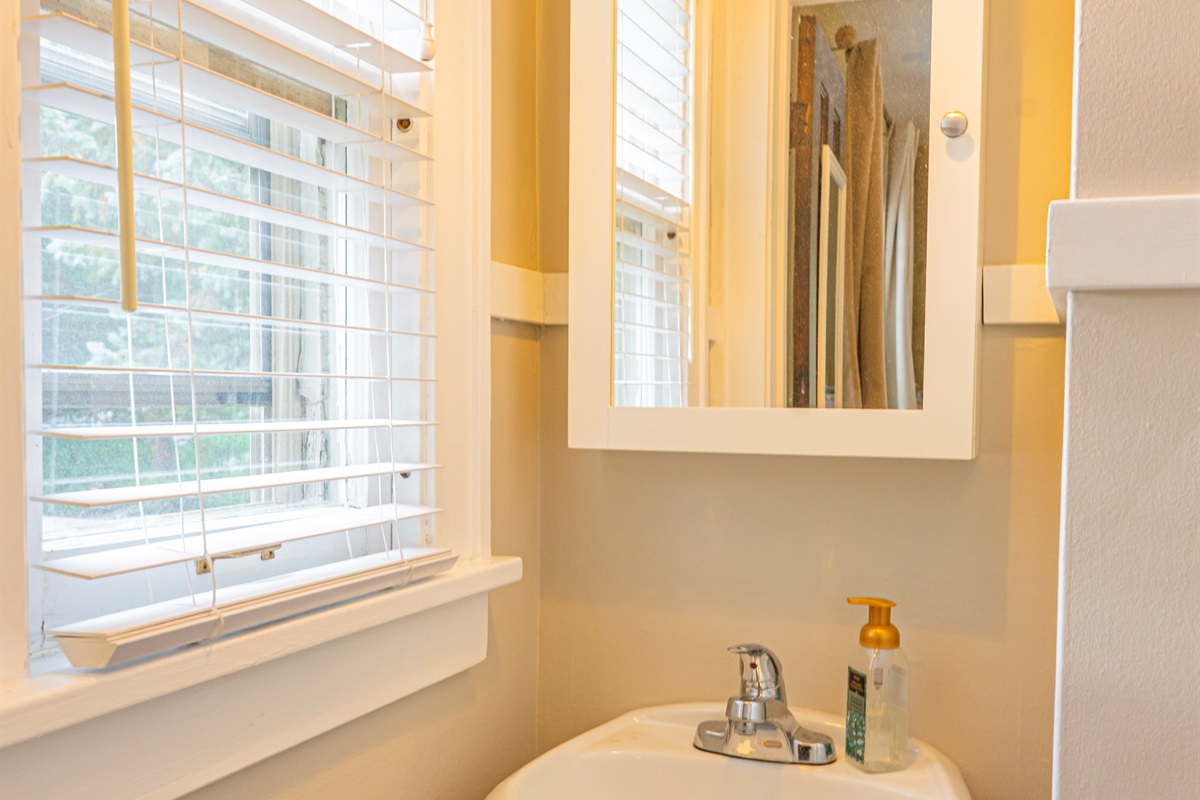 Bedroom #1:  Additional Dressing Area, equipped with it’s own Sink, Electrical Outlet, & Medicine Cabinet