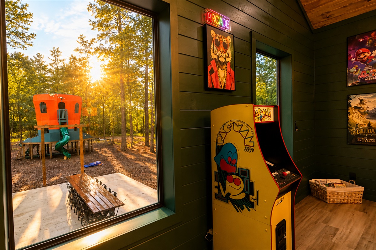Game Room: Enjoy retro fun with arcade games and a stunning view of the outdoor play area!