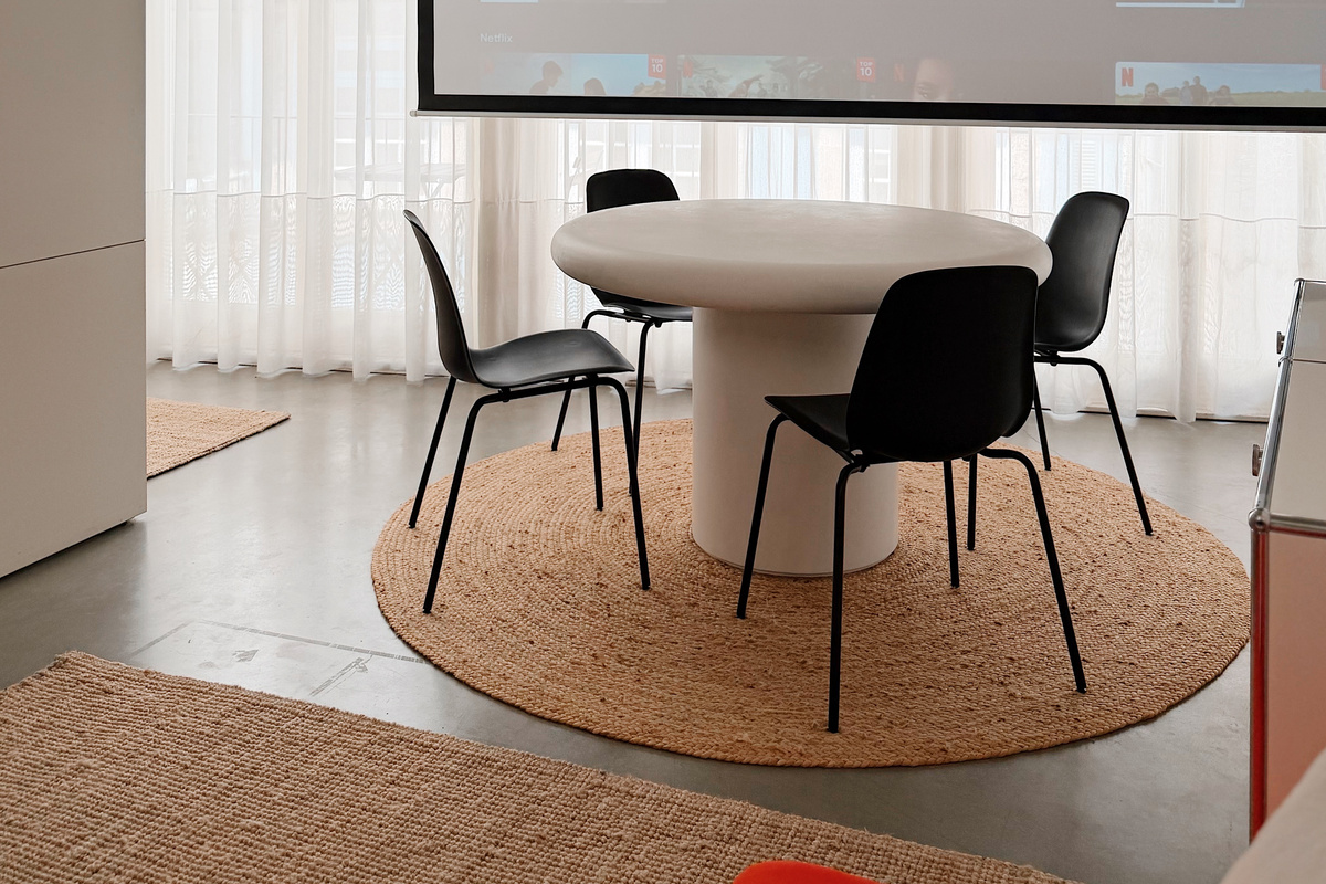Motorized projection screen. Bring your own logins.
